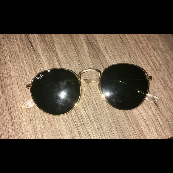 ray ban round sunglasses black and gold